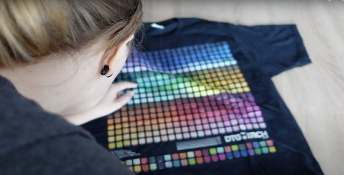 Checking colour patches on a black t-shirt